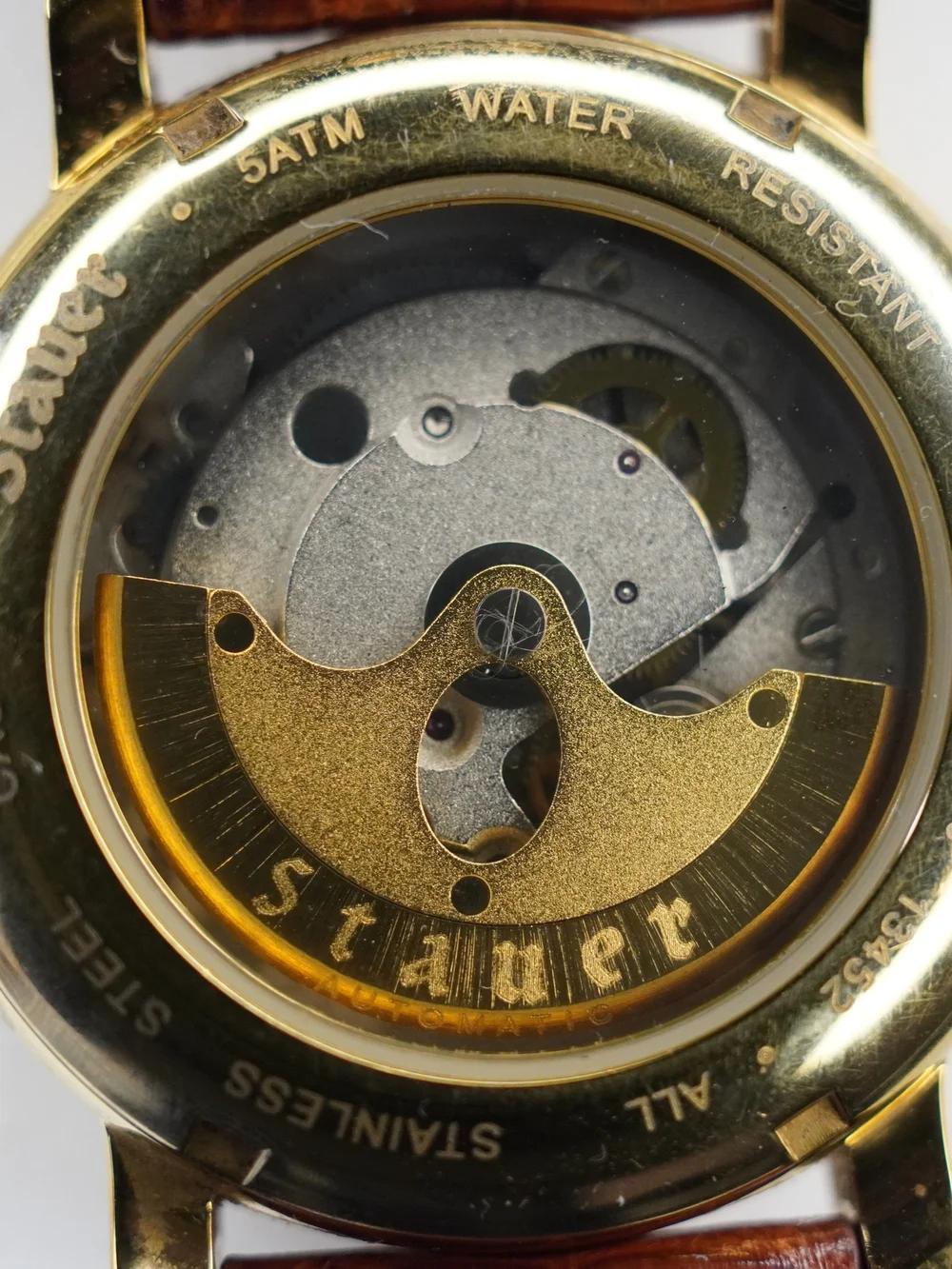 Stauer 13452 Automatic 27 Jewels Day Date 24-Hour Gold Tone Silver Dial